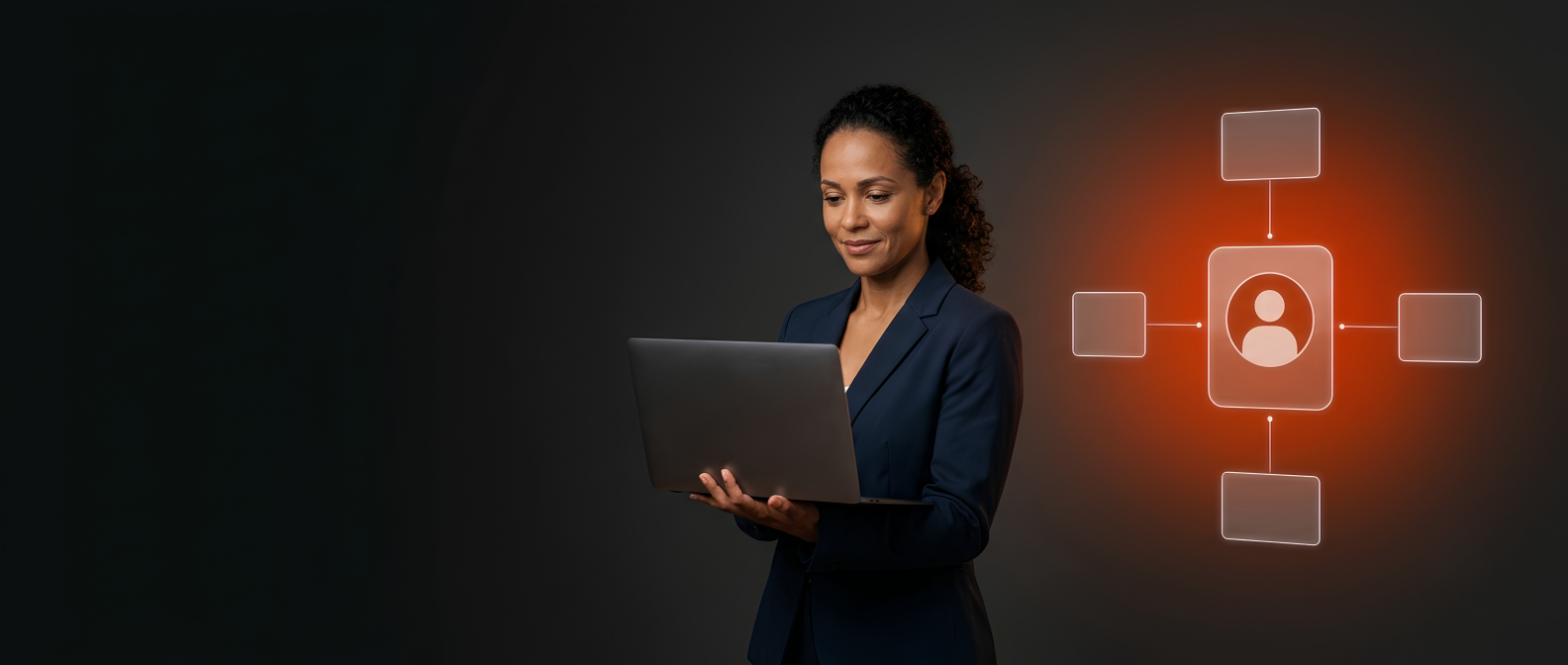 Mulher de blazer usando um notebook ao lado de um ícone luminoso de perfil de usuário conectado a quatro blocos ao redor, sobre fundo escuro
